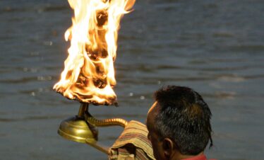 Experience the spiritual essence of the Ganga Aarti ritual by the river in Haridwar, India.